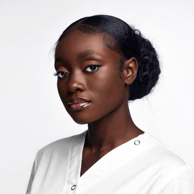 Beautiful African-American woman in white top