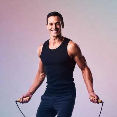 Muscular man jumping rope