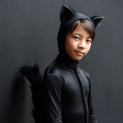 Boy in black cat costume