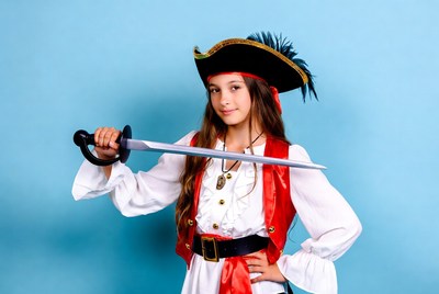 Girl in pirate costume holding sword