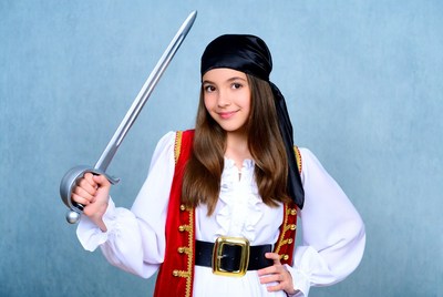 Girl in pirate costume holding sword