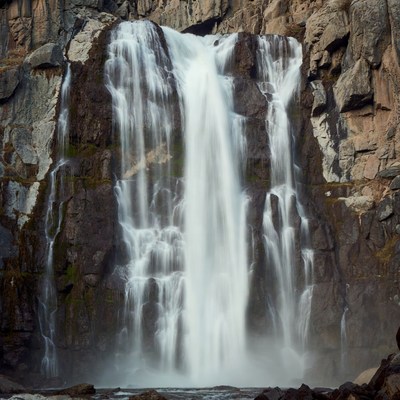 Majestic waterfall cascading over rocky cliffs