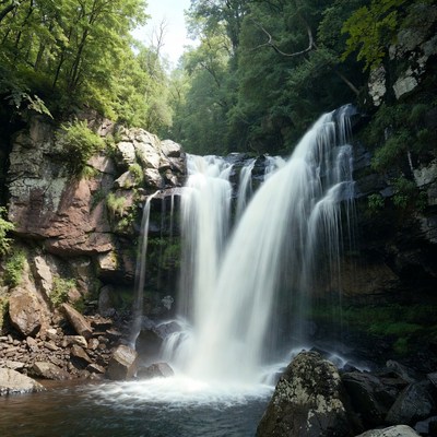 Waterfall cascading over mossy rocks
