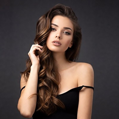 Beautiful woman with long wavy brown hair