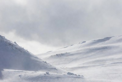 Snowy Mountains in Foggy Weather