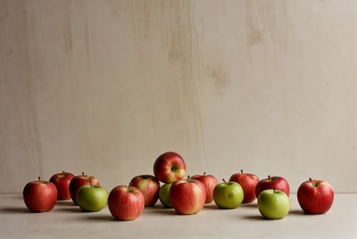 Red and Green Apples on Wood