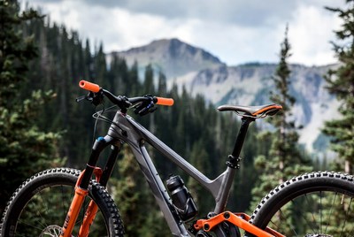 Gray mountain bike with orange accents
