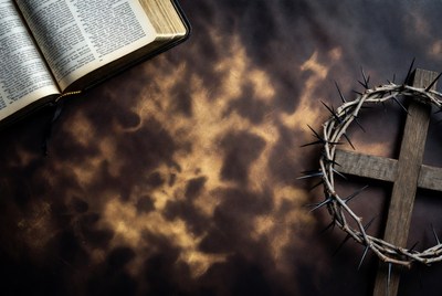 Open Bible with Crown of Thorns and Cross