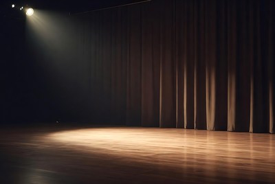 Empty theater stage with spotlight