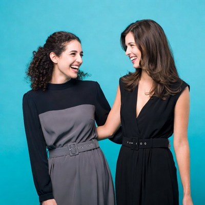 Two women laughing together