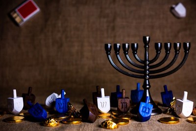 Hanukkah Menorah with Dreidels and Coins