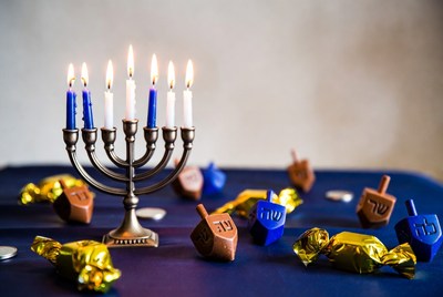 Lit Hanukkah Menorah with Dreidels