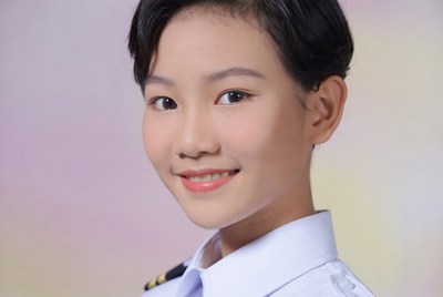 Asian girl in school uniform smiling