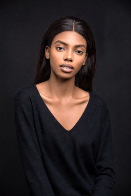 Beautiful Black woman in black sweater