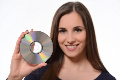 Woman holding CD disc