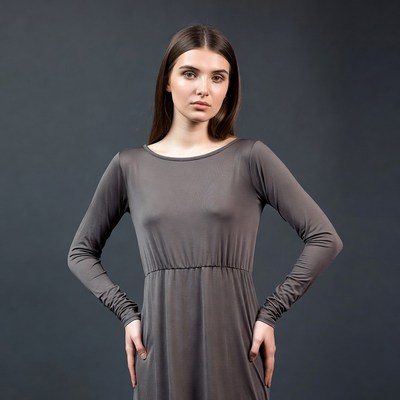 Woman in gray long sleeve dress
