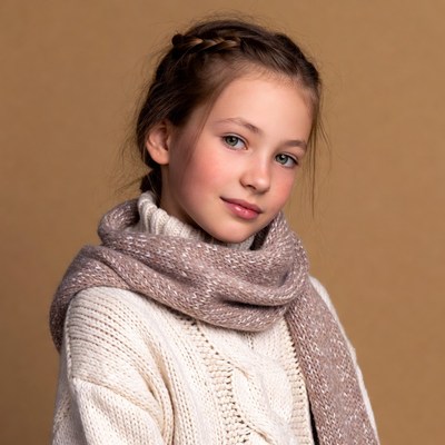 Girl in white sweater and scarf