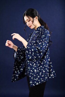 Asian woman in navy floral kimono
