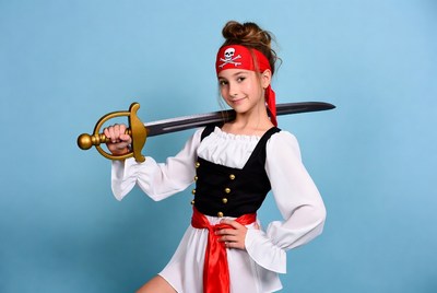 Girl in pirate costume holding sword