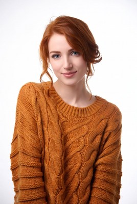 Redhead woman in orange sweater