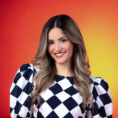 Smiling woman in black white dress