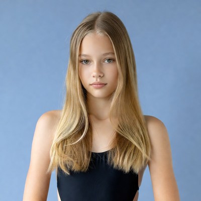 Teen girl in black swimsuit