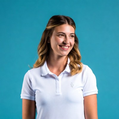 Smiling woman in white polo shirt