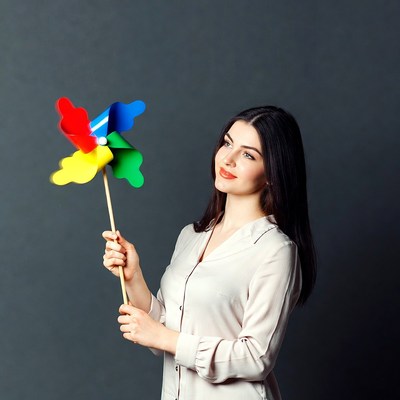 Woman holding colorful pinwheel