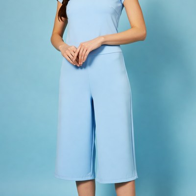 Woman in blue jumpsuit