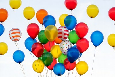 Colorful Balloons Floating in Sky
