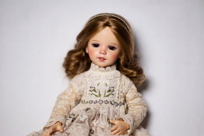 Girl doll in lace dress