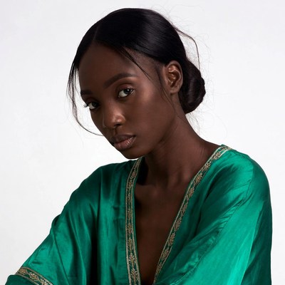 African-American woman in green silk robe