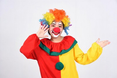 Clown waving hand happily