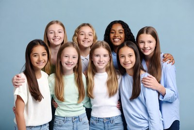 Group of diverse girls hugging together
