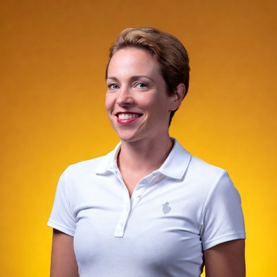 Smiling woman in white polo shirt