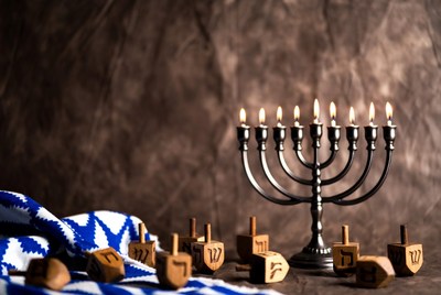 Lit Hanukkah Menorah with Dreidels