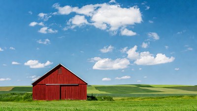 Red Barn in Green Farm Fields