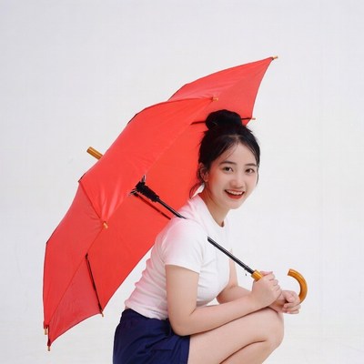 Asian woman holding red umbrella