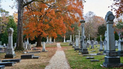 Autumn Cemetery Path with Gravestones