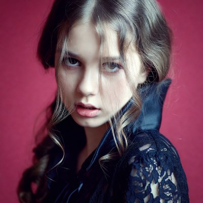 Young girl in black lace dress