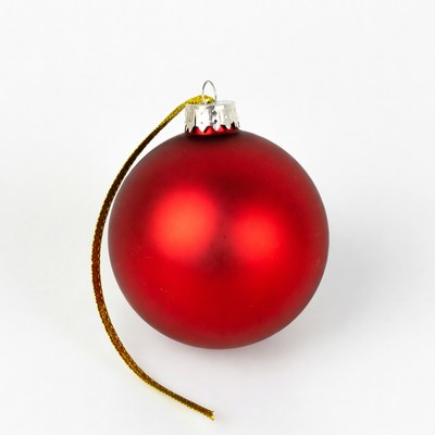 Red Christmas ornament on white