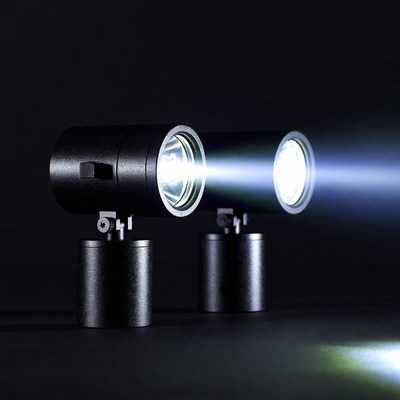 Two Black Spotlights Beaming Light