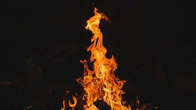 Flames rising on black background