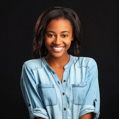 Smiling African-American woman in blue denim shirt