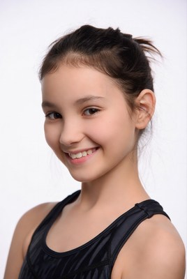 Smiling Asian girl in black tank top