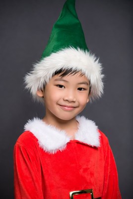 Asian boy in elf costume