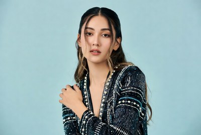 Asian woman in beaded black dress