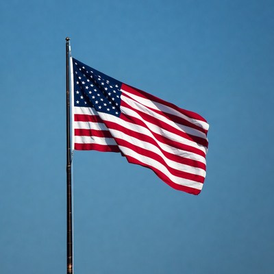 American flag waving on pole