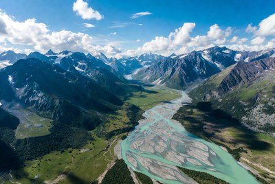 Turquoise River in Snowy Mountains