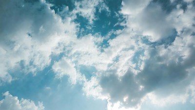 Blue Sky with Fluffy Clouds